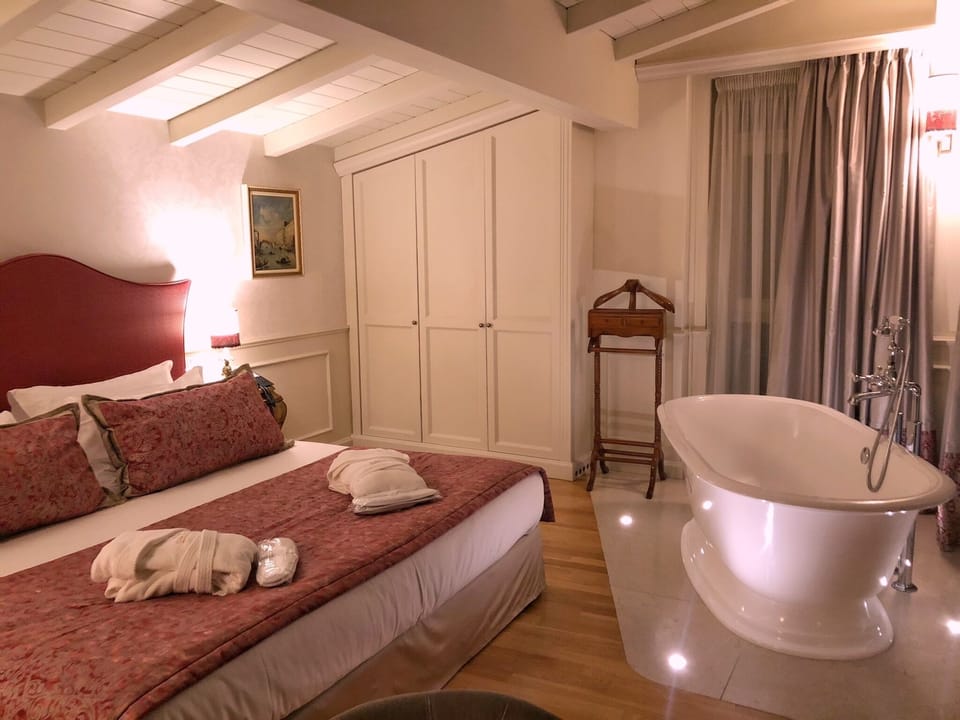 Luxury Suite, City View | Frette Italian sheets, premium bedding, down comforters
