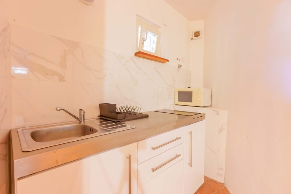 Mini-fridge, microwave, electric kettle