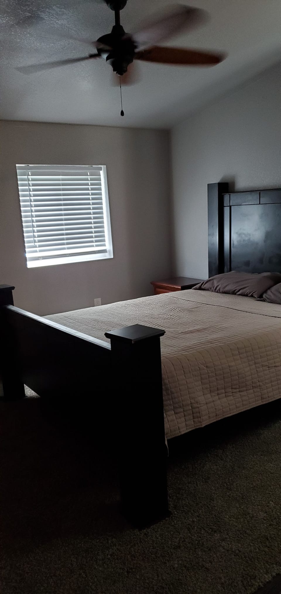 Master bedroom, upstairs, with a queen-sized bed.