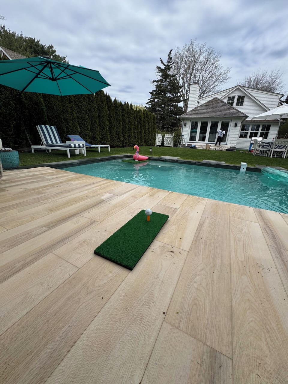Pool deck area overlooking back yard