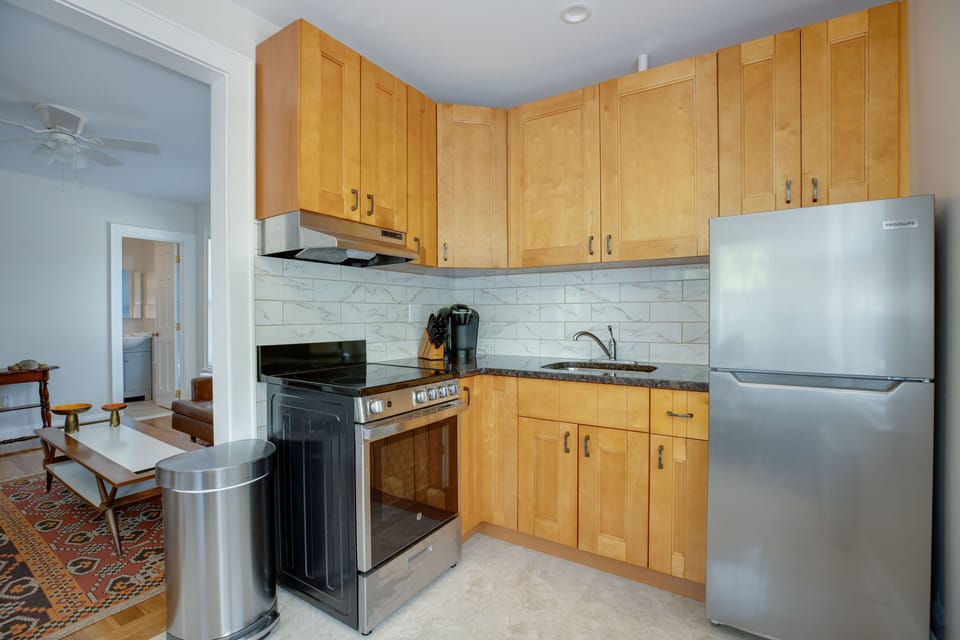 New full kitchen with granite counter.  Perfect for a meal at home if you wish