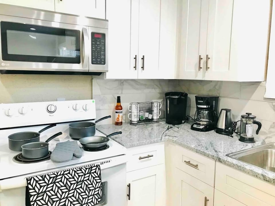 Kitchen / Coffee Station 
- Stove 
- Microwave
- Water warmer