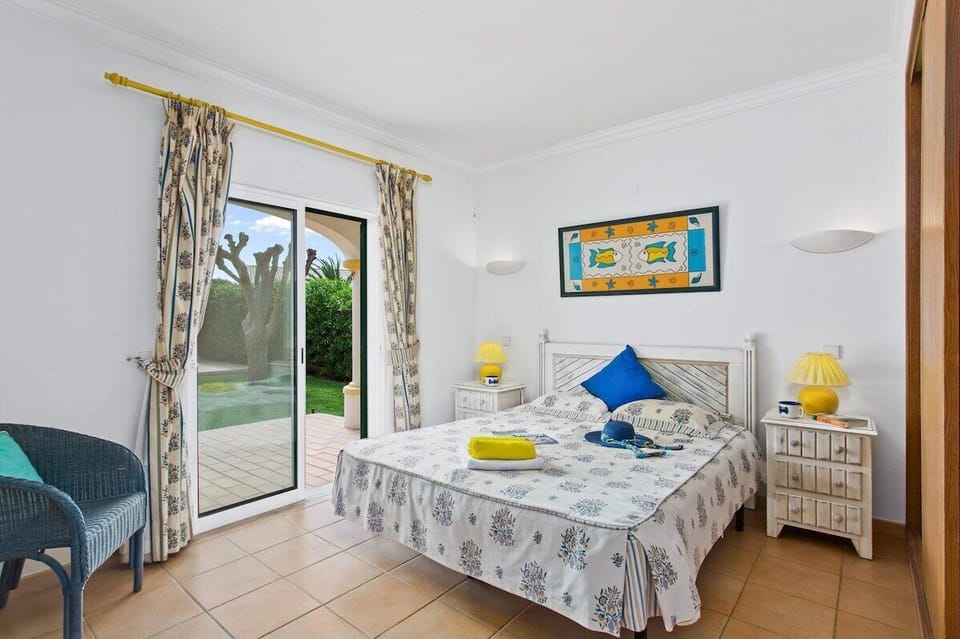 Ground Floor  Double Bedroom with Ensuite Bathroom, Patio Doors leading to Hammock, Outside Seating and Gardens