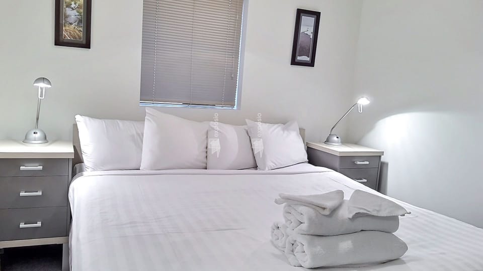 King Bed with crisp white linens