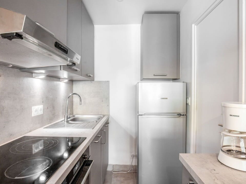 Property, Room, Interior Design, Architecture, Kitchen, House, Countertop, Floor, Major Appliance, Cabinetry