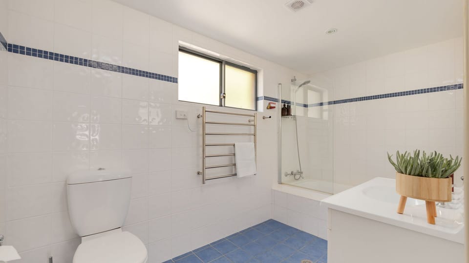 Downstair family bathroom with relaxing spa bath