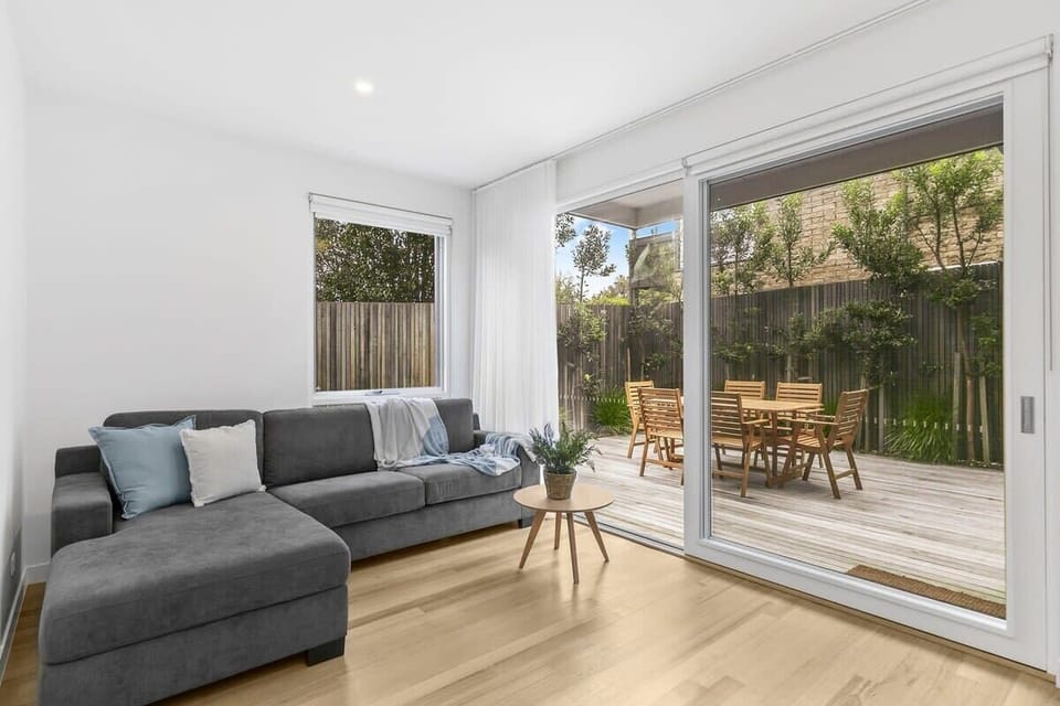 A separate relaxation space comes complete with a chaise lounge, electric log fire heater, and another Smart TV