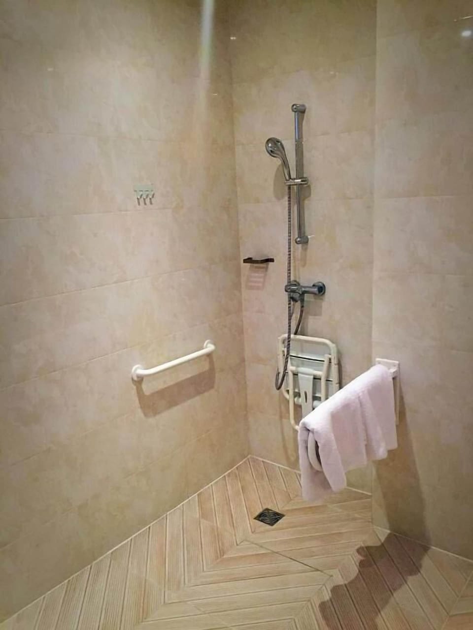 Shower, hair dryer (on request), towels, soap