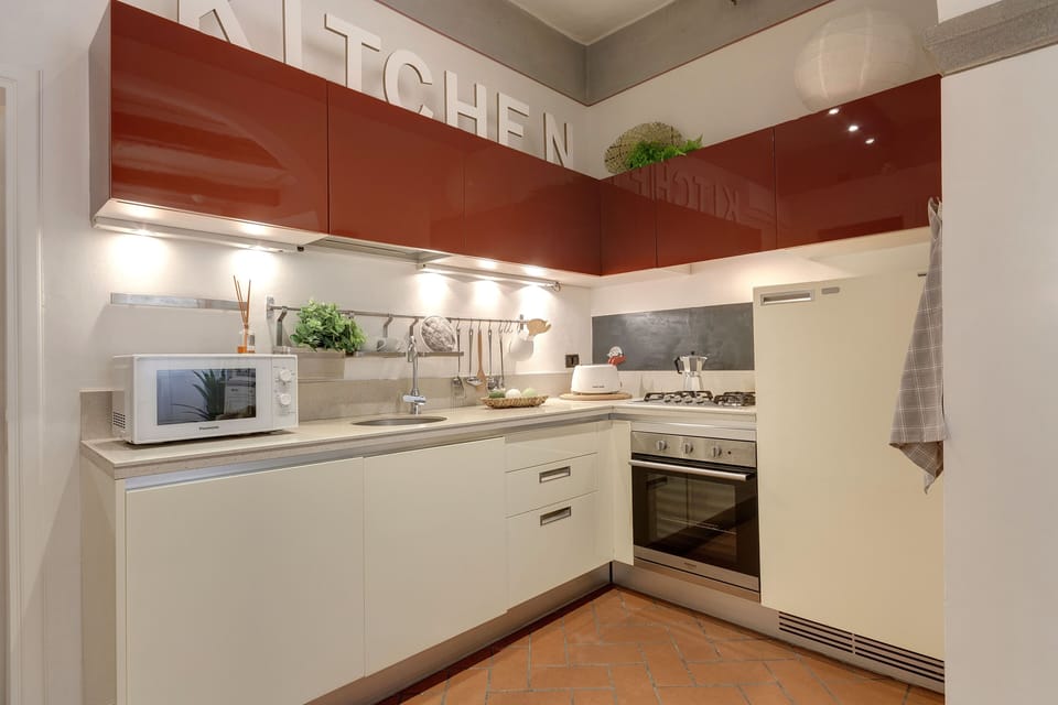 Apartment, 1 Bedroom | Private kitchen | Full-size fridge, microwave, oven, stovetop