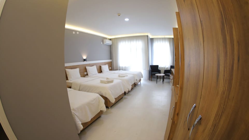 Standard Quadruple Room | Desk, free WiFi, bed sheets