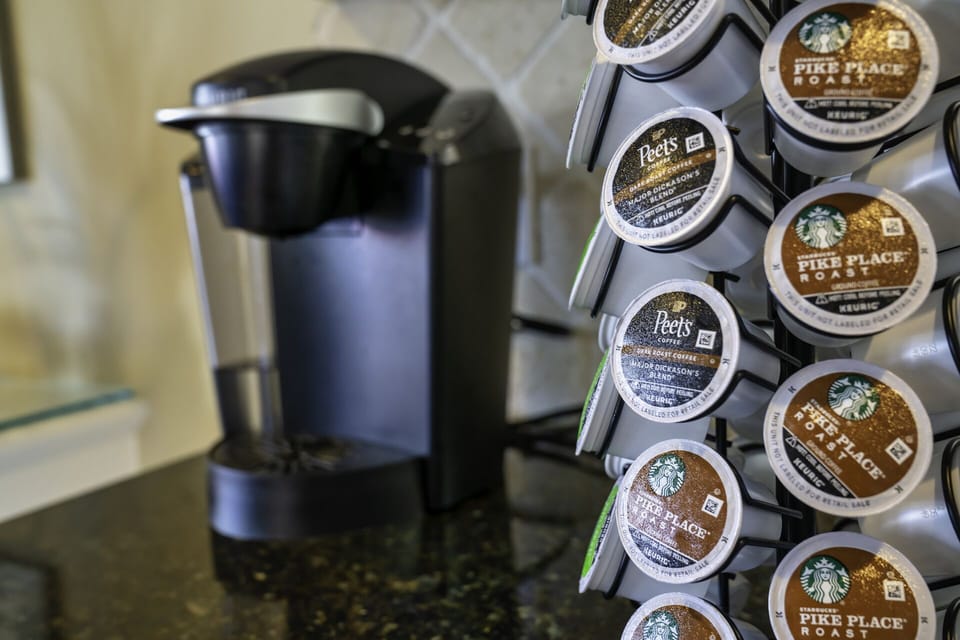 Coffee maker and 36 cups of coffee