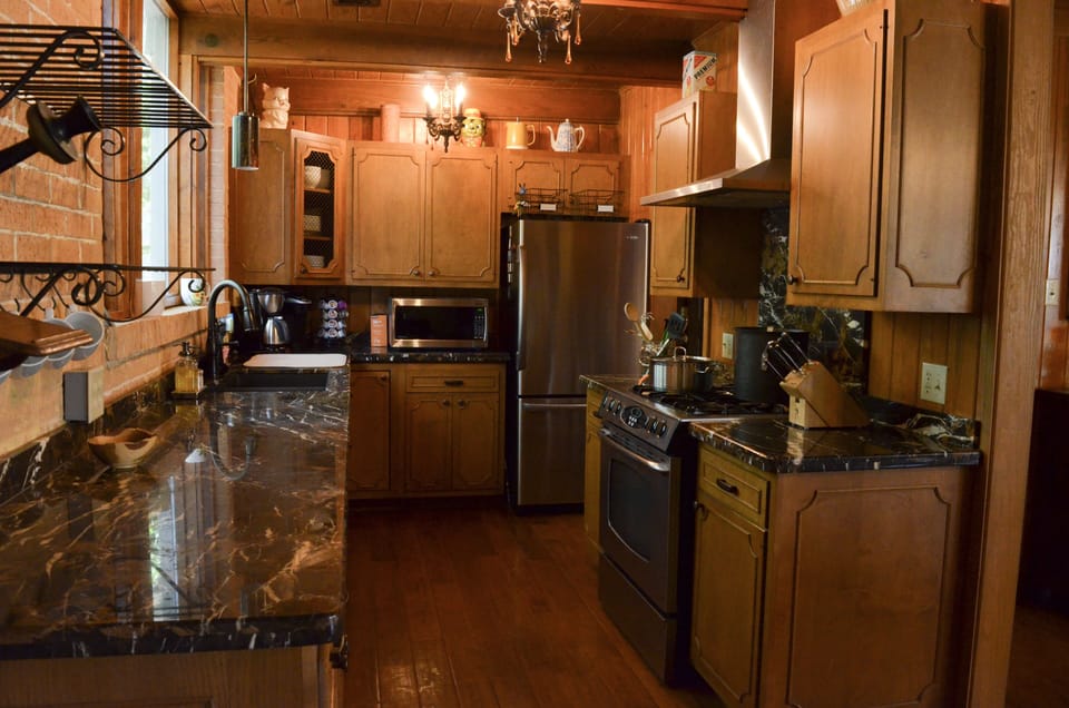 Walk thru kitchen keeps everyone flowing around those fresh made goodies.