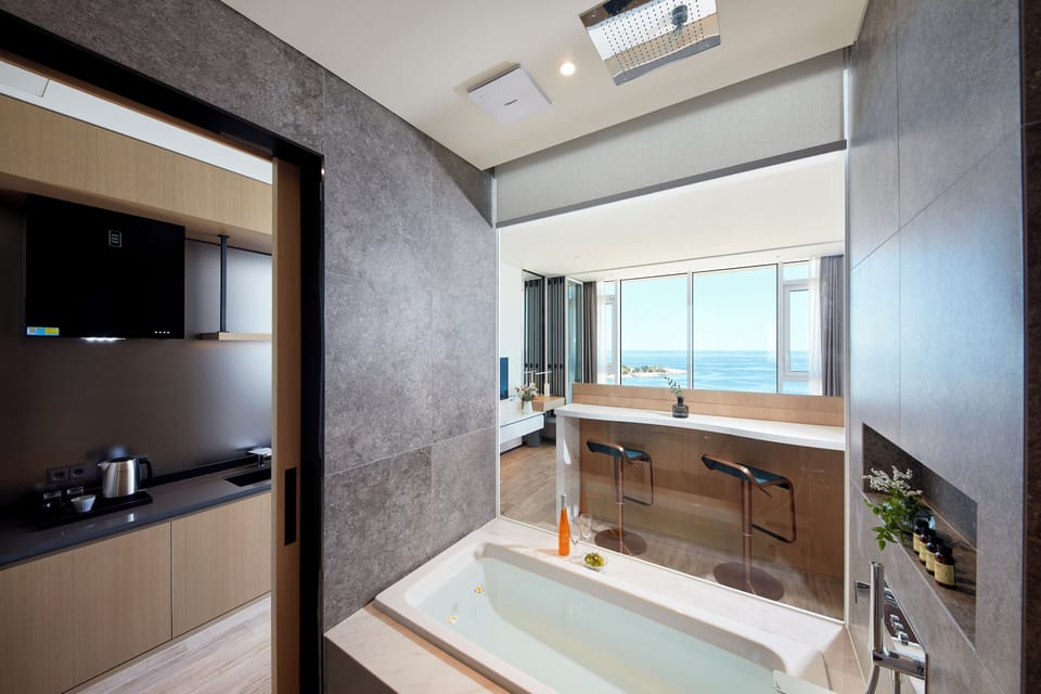 Deluxe (Ocean/1 Double) | Premium bedding, blackout drapes, free WiFi, bed sheets