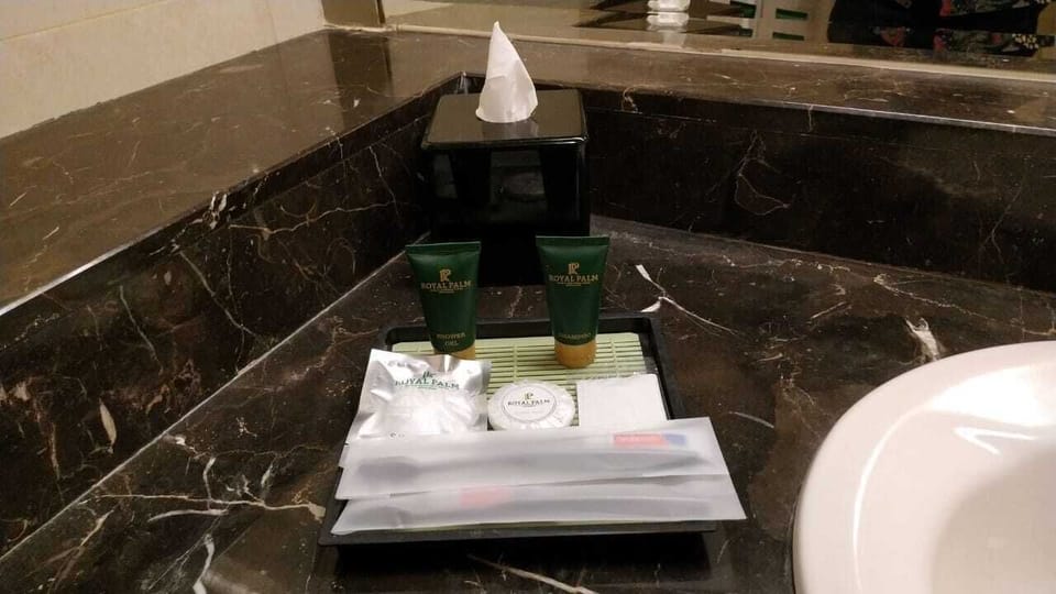Shower, free toiletries, hair dryer, slippers