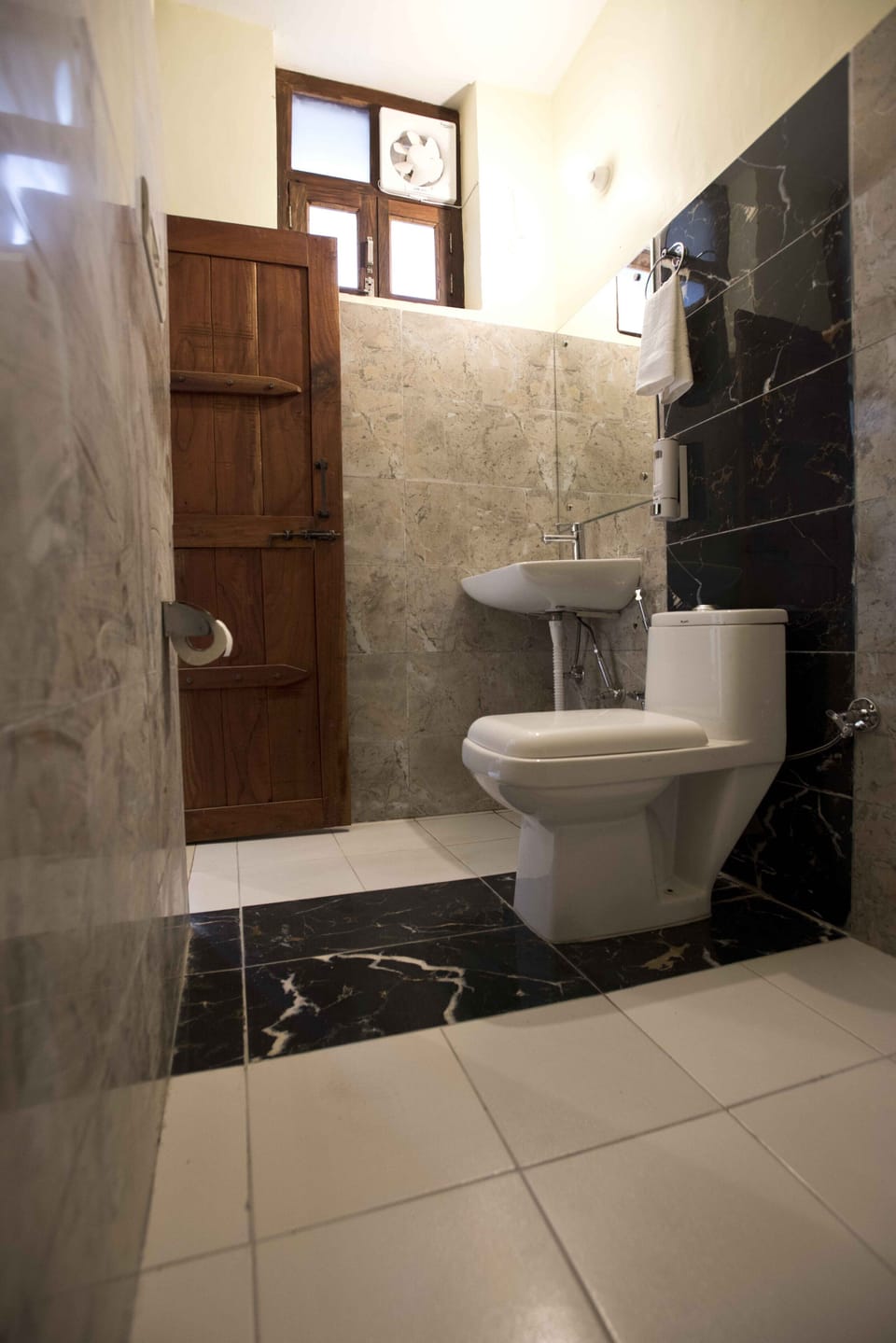 Shower, rainfall showerhead, towels, soap