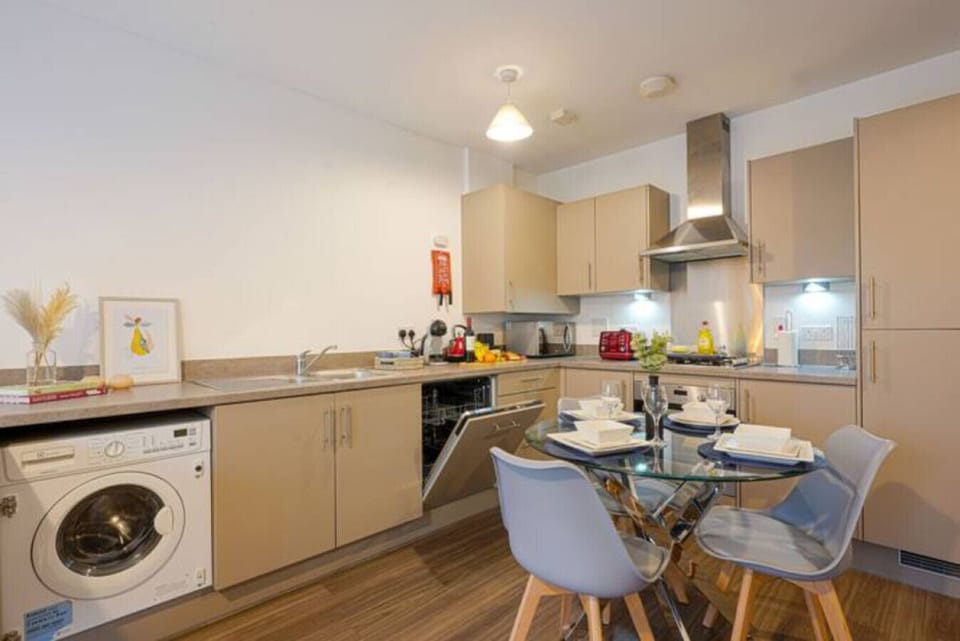 Integrated washer dryer, dishwasher and fridge freezer