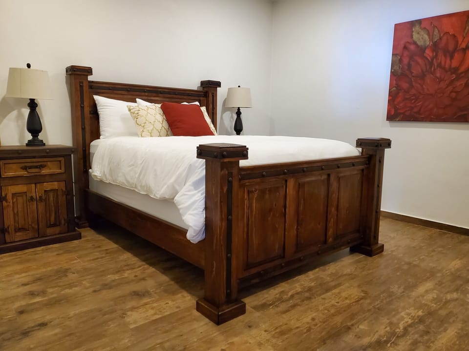 Peaceful room with a plush queen bed for the perfect night's sleep.