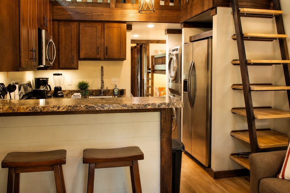 Kitchen With Stairs To Loft