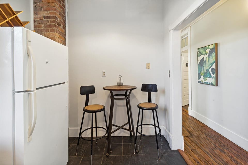 The kitchen has a dining area for two.
