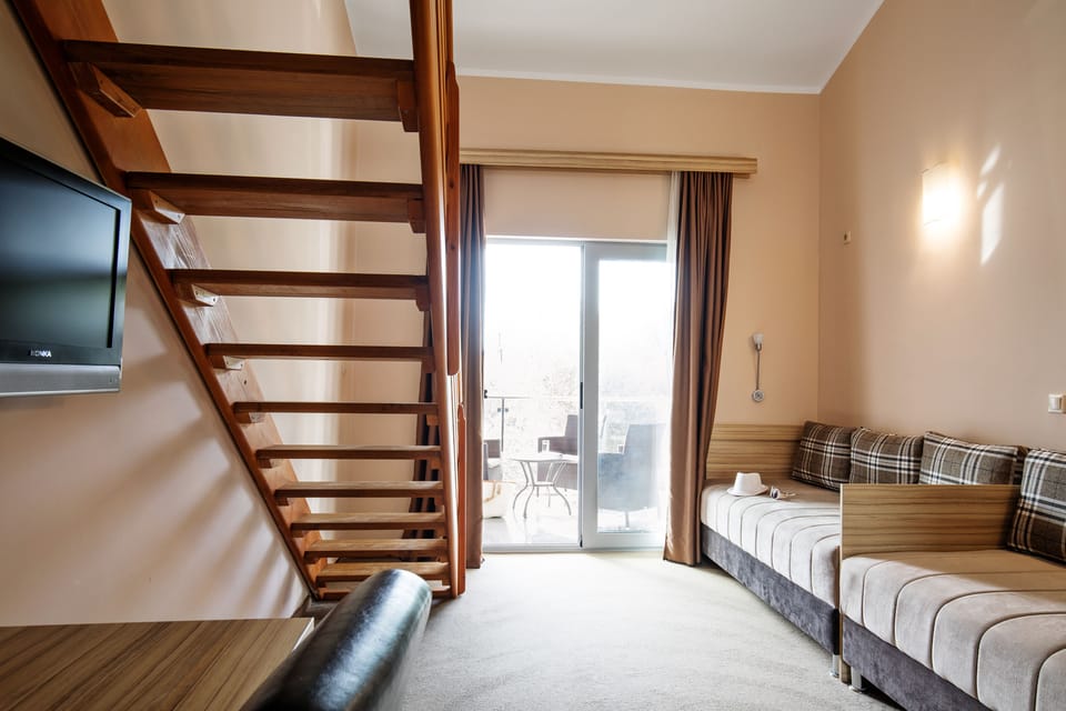 Apartment | Minibar, desk, cribs/infant beds, free WiFi