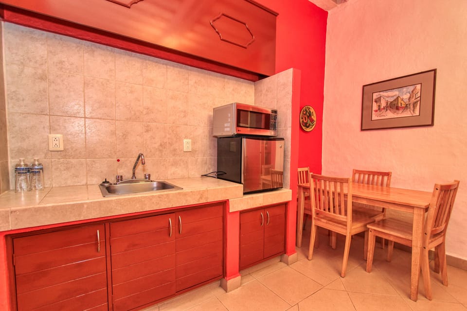 Family Suite, 2 Double Beds, Refrigerator & Microwave, City View | 12 bedrooms, in-room safe, iron/ironing board, free WiFi