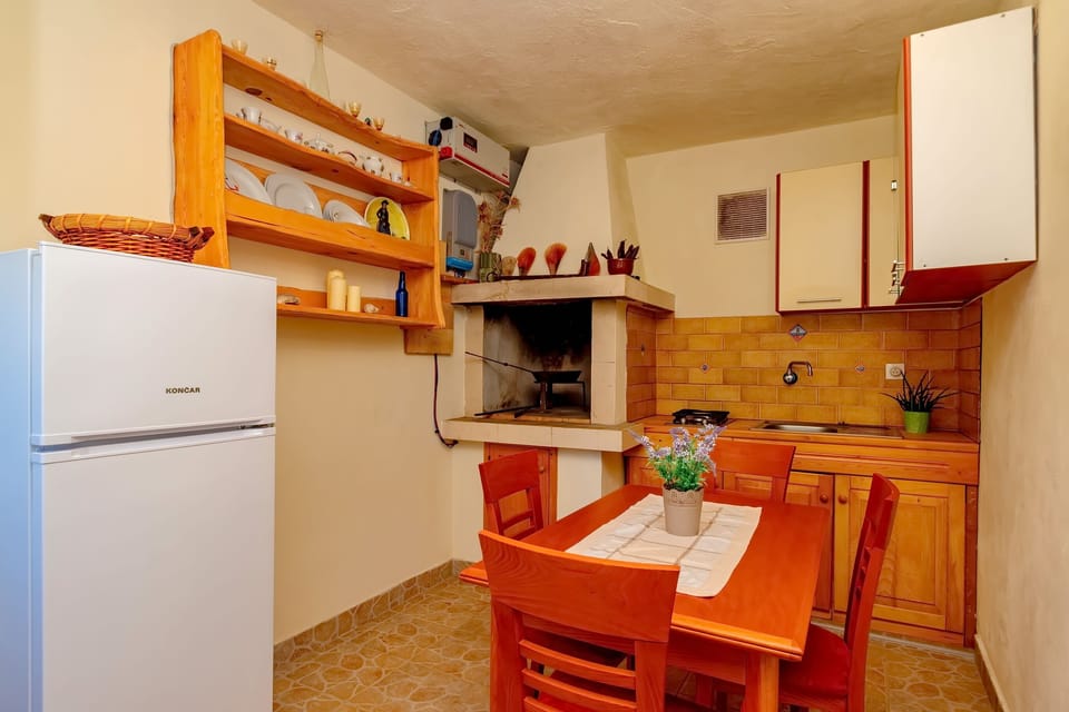House (One Bedroom House with Terrace) | Private kitchen | Fridge