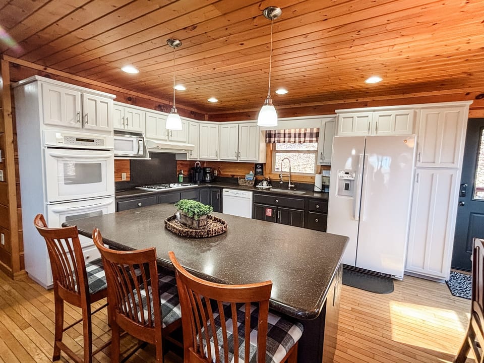 Newly renovated kitchen! Just imagine cooking in here with the new gas range and double oven!