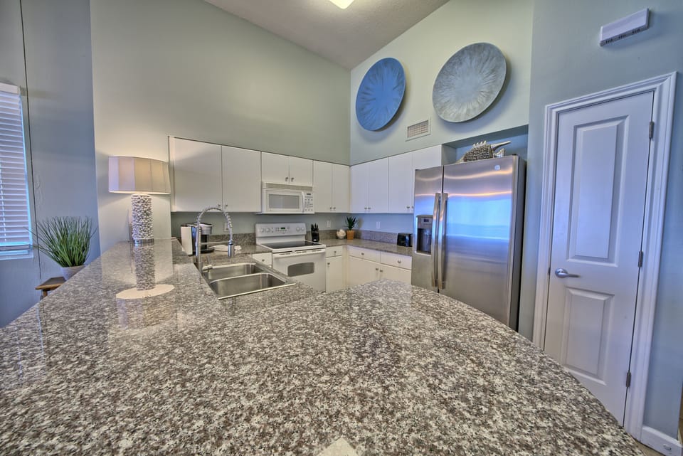 The best vacation memories often begin in the kitchen. With generous counter space, seating for the group, and an open layout, everyone can stay together while meals and memories are being made.