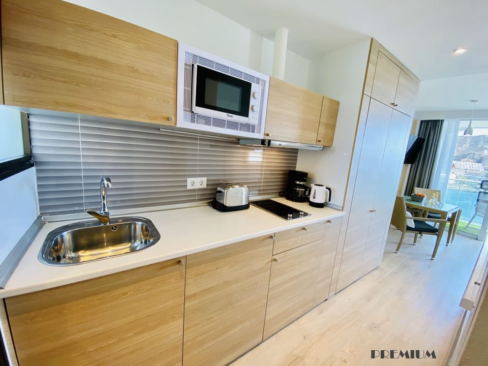 Premium Studio, Sea View | Private kitchen | Mini-fridge, electric kettle