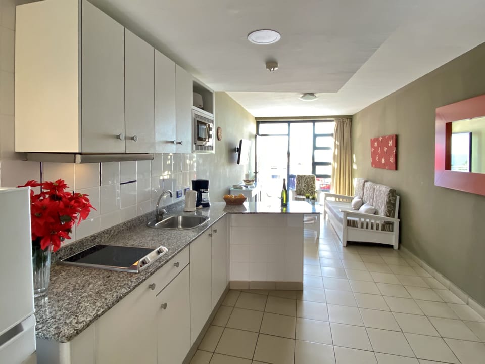 Apartment, 1 Bedroom | Private kitchen | Mini-fridge, stovetop, cookware/dishes/utensils