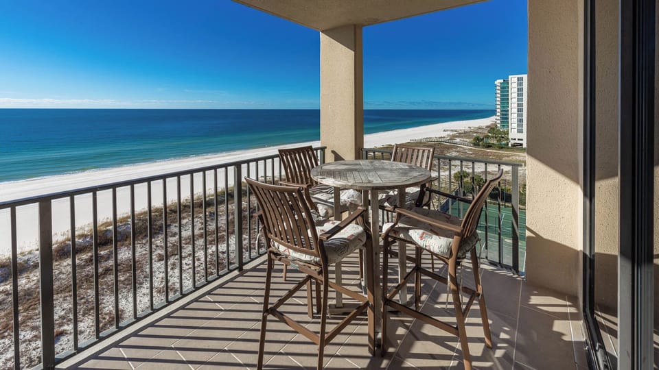 Enjoy your morning coffee at the round table, while taking in the expansive views of the tranquil waters and shore