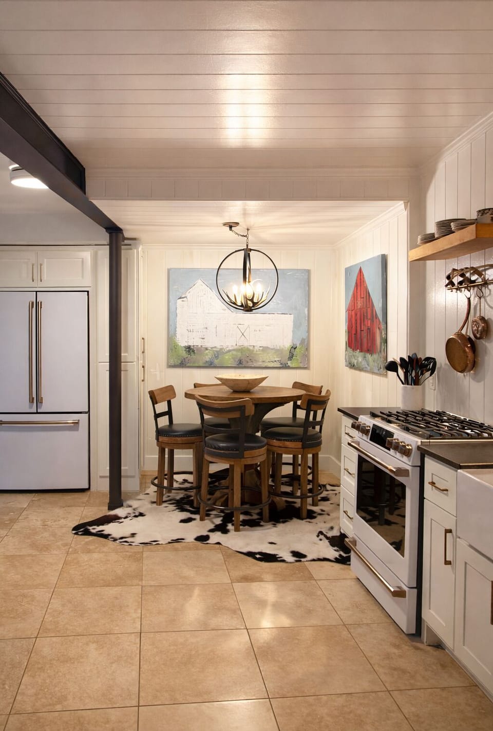 Enjoy the white GE Cafe appliances in the heart of the chalets kitchen.