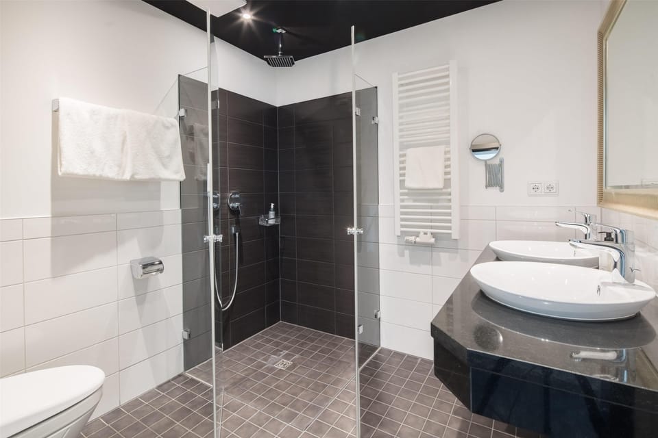 Rainfall showerhead, free toiletries, hair dryer, towels