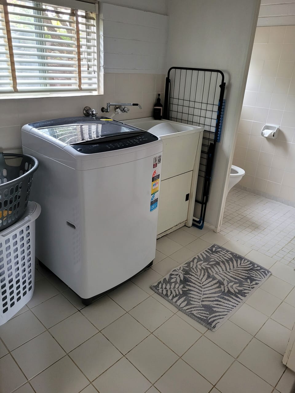 Laundry, toilet, shower downstairs