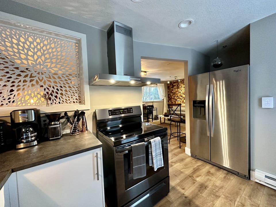 Full-sized refrigerator with water/ice dispenser and induction range (DW too)