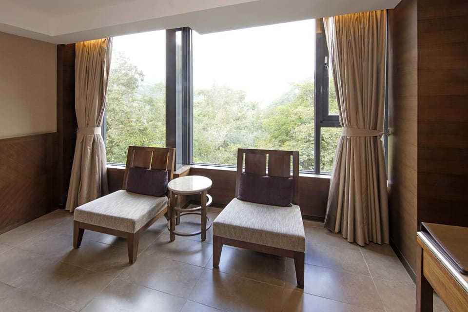 Great Roots Twin Guest Room | Down comforters, in-room safe, blackout drapes, soundproofing