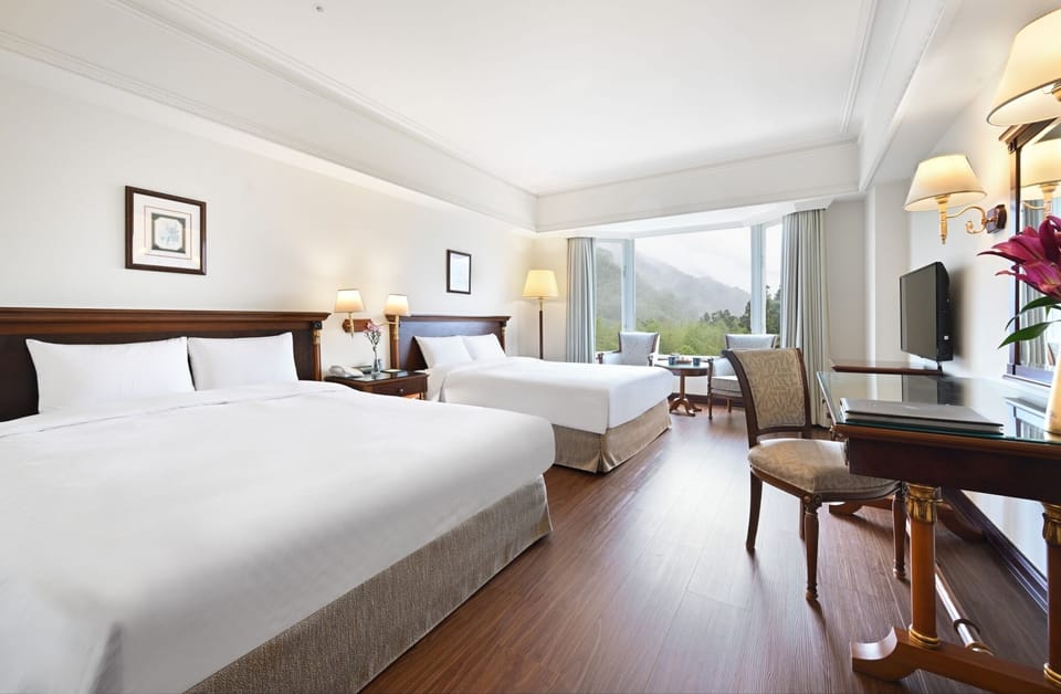 Classic Quadruple Room, 2 Double Beds | Down comforters, in-room safe, individually decorated