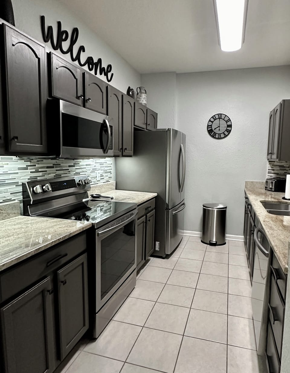 Kitchen with Granite & New Stainless Steel Appliances 