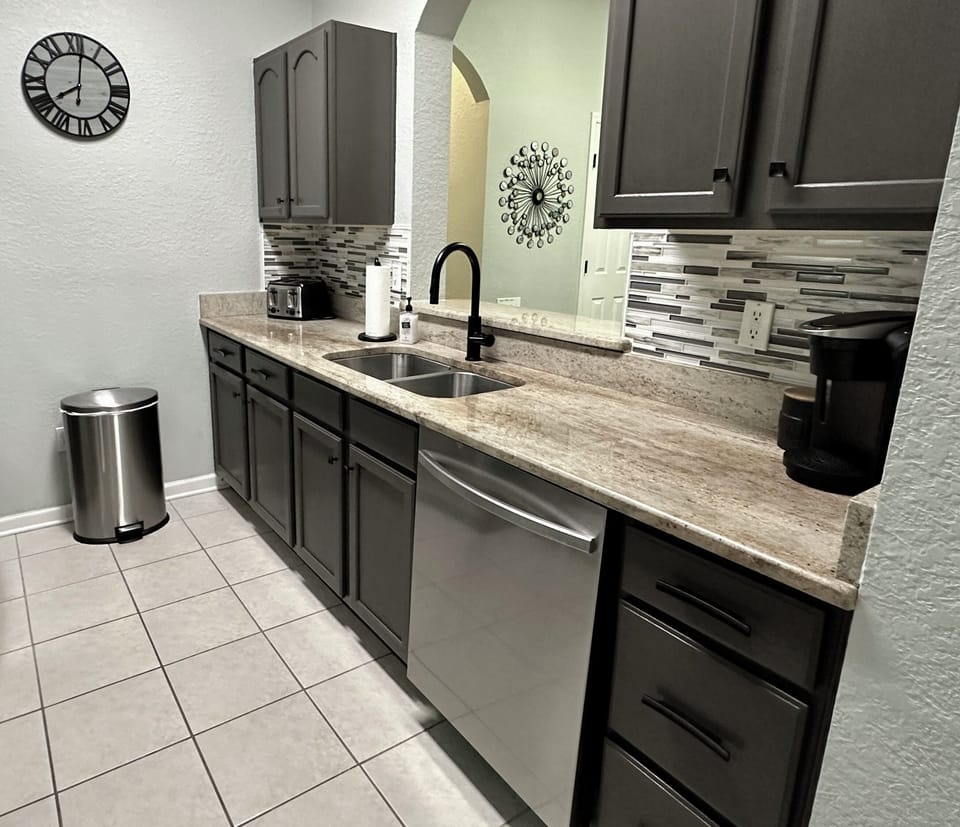 Granite Countertops with Pass Through Bar.