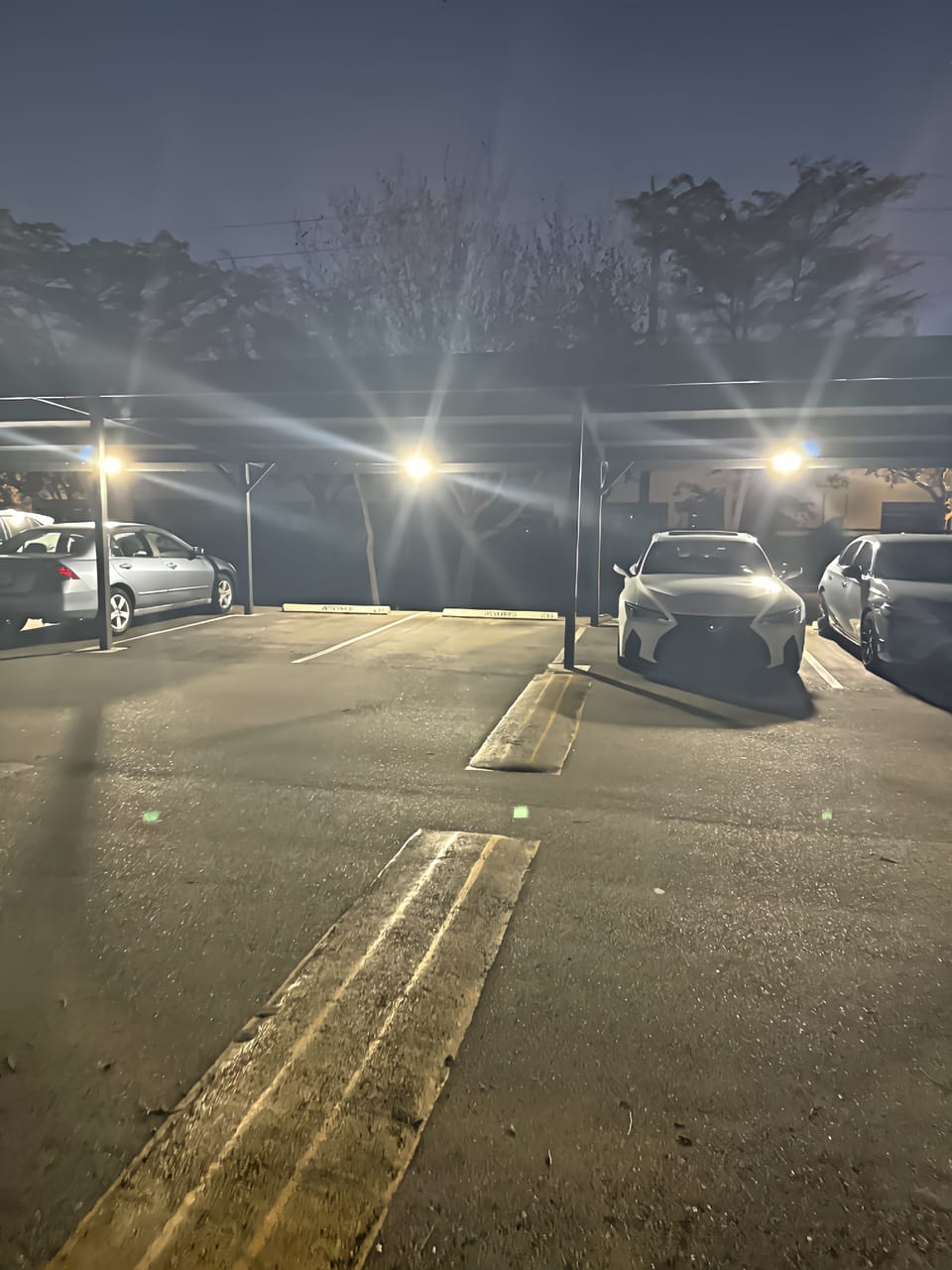 Carport 633 across from condo
