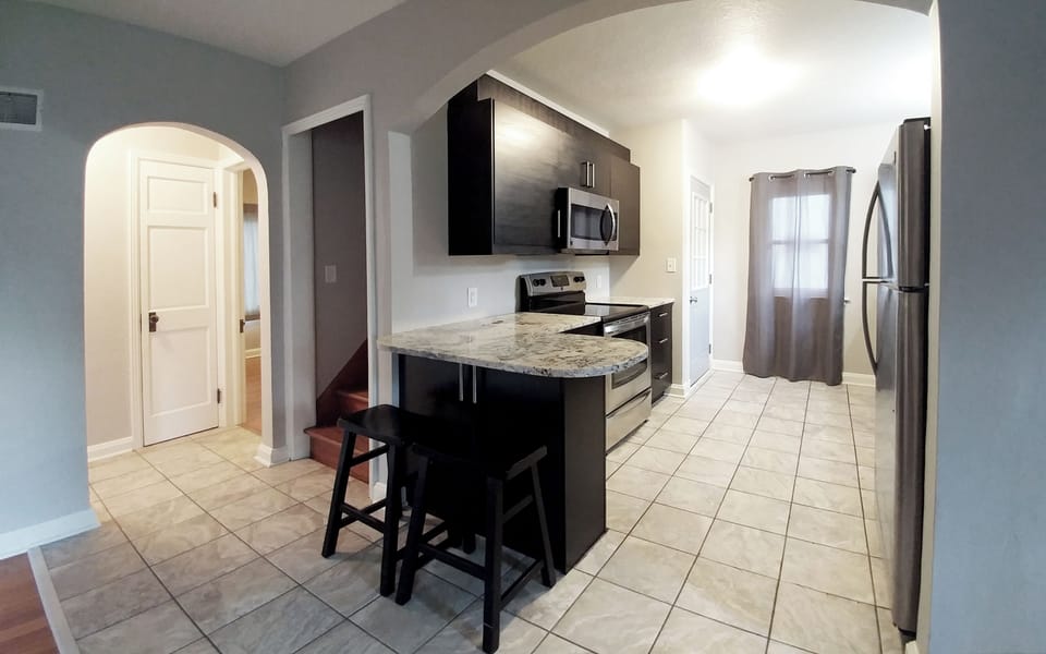 High-end kitchen with granite counters.