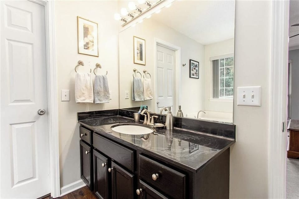 Master bathroom with large walk-in closet.