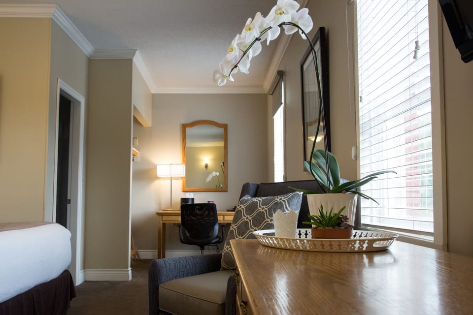 Premium bedding, pillowtop beds, desk, laptop workspace