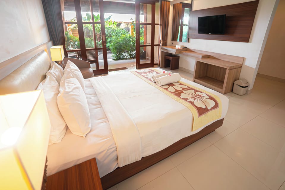 Deluxe Garden Terrace | In-room safe, desk, free WiFi, bed sheets