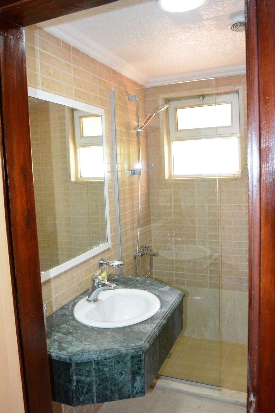 Rainfall showerhead, designer toiletries, hair dryer, bathrobes