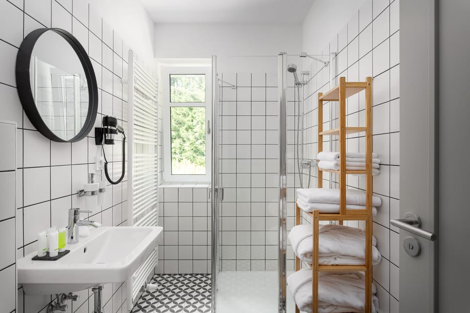 Double Room | Bathroom | Shower, designer toiletries, hair dryer, bathrobes