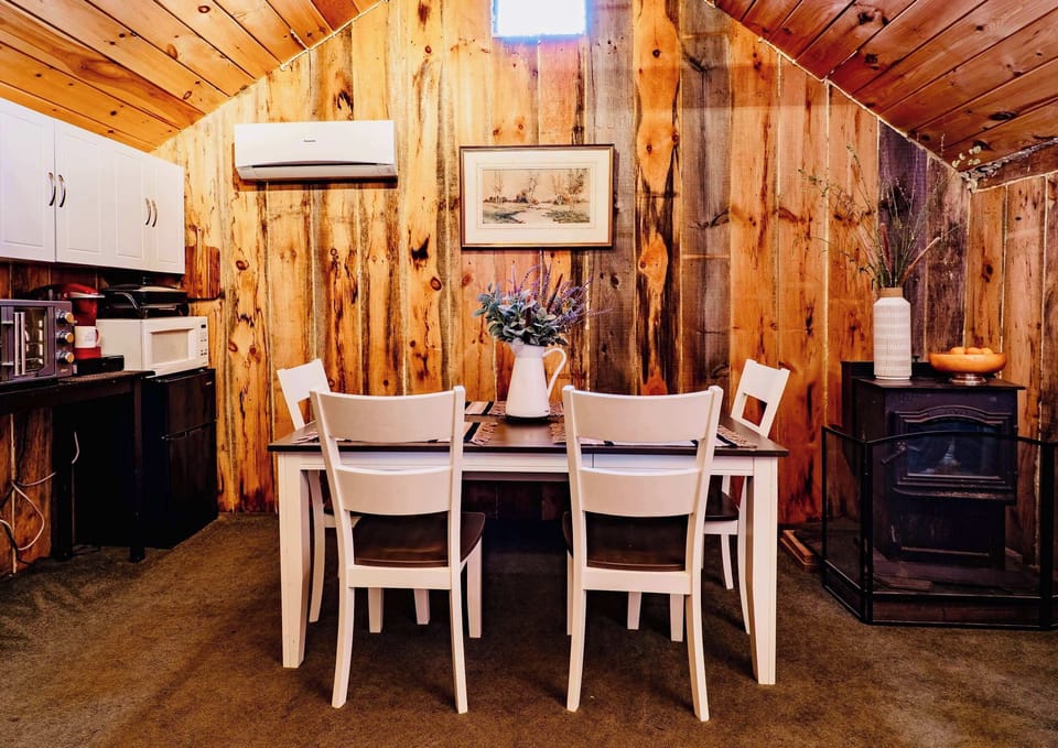 [Dining Room, Upstairs] "Grateful that our family of six could comfortably spread out around the expansive dining table."