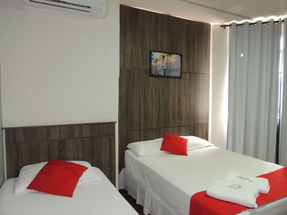 Triple Room, Multiple Beds | Pillowtop beds, desk, free WiFi, bed sheets