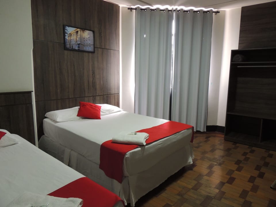Triple Room, Multiple Beds | Pillowtop beds, desk, free WiFi, bed sheets