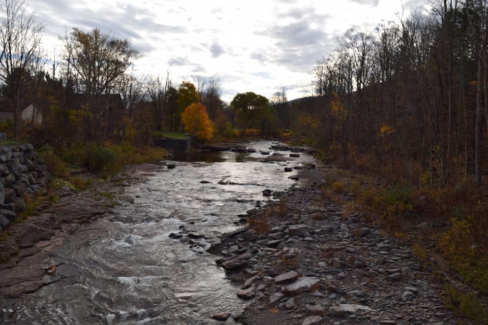 River with a swimming hole in front of the cabin